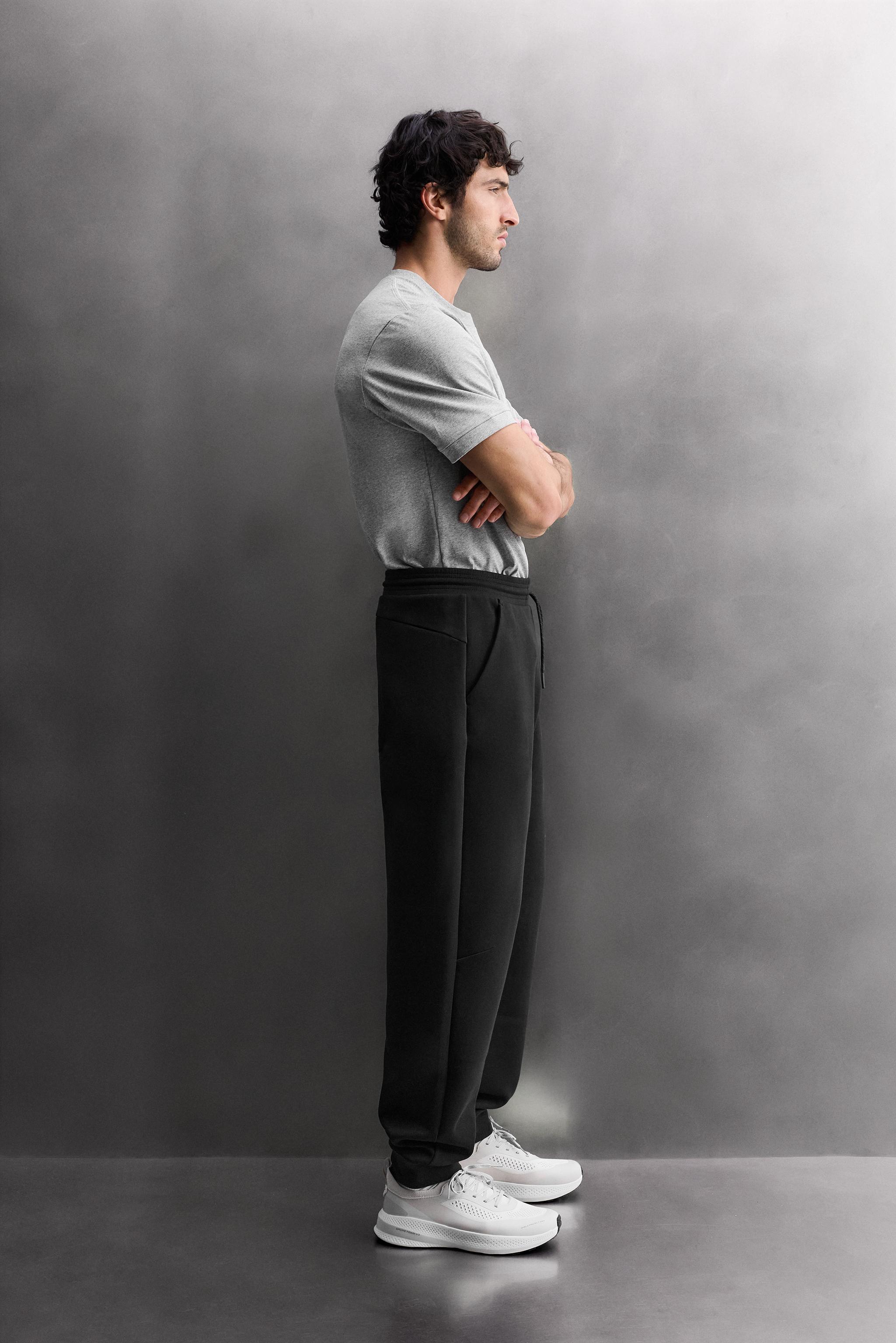 TECHNICAL PANTS WITH ZIPPERS